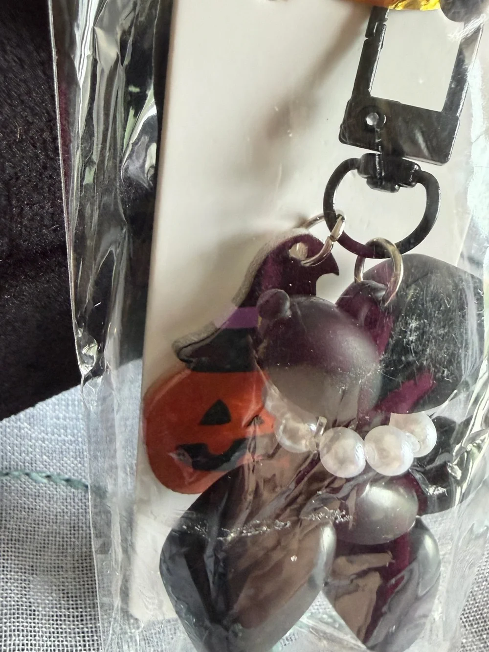 Mint Black Balloon Dog Keychain with Pearl Collar and Orange Pumpkin Charm